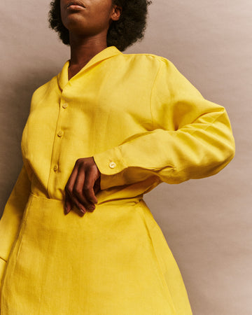 Men and women long sleeve shirt in yellow linen deadstock fabric smocking collar shawl collar mother of pearl buttons model Françoise LES DUNES.